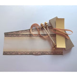 decorative blank scroll with gift box and gold accents, unassembled