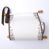 Decorative scroll with brown and gold accents
