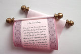 Pink scroll with decorative border, custom text and gold accents 