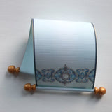 blue and gold paper scroll 