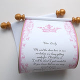 Custom printed white paper scroll with pink crown and design