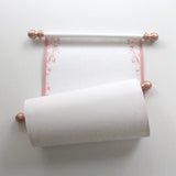 Decorative scroll with rose gold accents