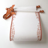 Decorative scroll with copper accents