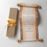 decorative custom printed scroll with gold accents,  and gift box with ribbon.