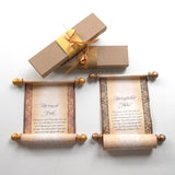 Two decorative custom printed scrolls with gold accents, accompanied by two gift boxes with ribbons.