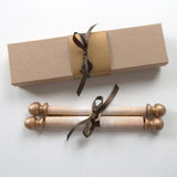 decorative scroll with brooch and gift box