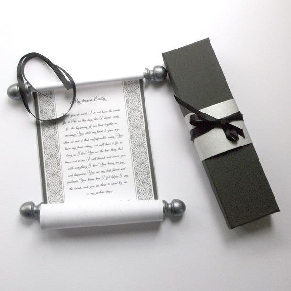 Custom printed decorative paper scroll with pewter finials, and a black gift box with silver band and ribbon