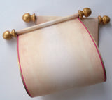Blank aged parchment paper scroll with red border, handwritten note or prop, 5x12" paper