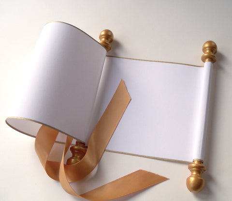 Blank white paper scroll for handwritten wedding vows, gold finials and accents, with white presentation box