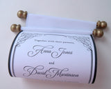 Traditional black and white wedding invitation scroll with aged gold accents and presentation box
